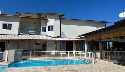 Casa em condomínio fechado com 5 quartos para alugar no Village da Serra, Tremembé  por R$ 8.000