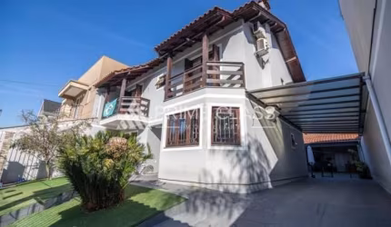 Casa com 3 quartos à venda na Rua Suécia, 209, Marechal Rondon, Canoas por R$ 1.225.000