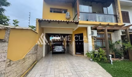 Casa com 3 quartos à venda na Rua Nevada, 33, Mato Grande, Canoas por R$ 640.000