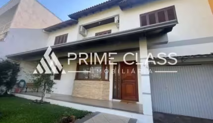 Casa com 5 quartos à venda na Rua das Petúnias, 144, Loteamento Bela Vista, Canoas por R$ 1.129.990
