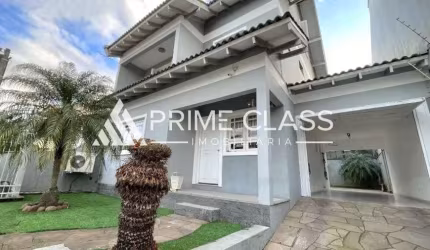 Casa com 3 quartos à venda na Rua Phoenix, 102, Moinhos De Vento, Canoas por R$ 980.000