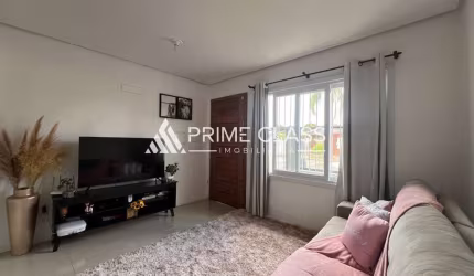 Casa com 3 quartos à venda na Rua Imbe, 681, Estância Velha, Canoas por R$ 470.000