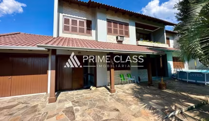 Casa com 5 quartos à venda na Rua Ney Brito, 140, Nossa Senhora das Graças, Canoas por R$ 897.000