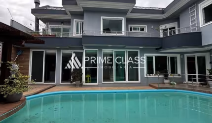 Casa com 3 quartos à venda na Rua das Hortênsias, 105, Igara, Canoas por R$ 1.995.000