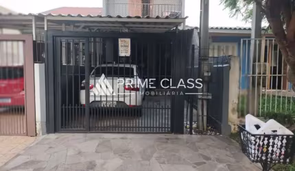 Casa em condomínio fechado com 3 quartos à venda na Rua Waldemar Silva de Souza, 85, São José, Canoas por R$ 371.000