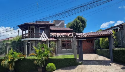 Casa com 3 quartos à venda na Borges de Medeiros, 61, Nossa Senhora das Graças, Canoas por R$ 1.299.900