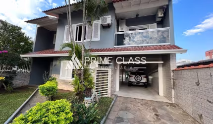 Casa com 4 quartos à venda na Rua Quinze de Novembro, 181, Nossa Senhora das Graças, Canoas por R$ 1.380.000