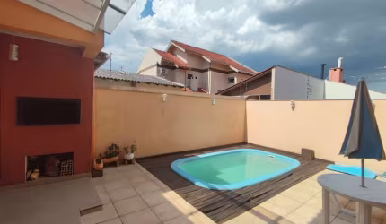 Casa com 4 quartos à venda na Rua da Alegria, 136, Moinhos De Vento, Canoas por R$ 948.000