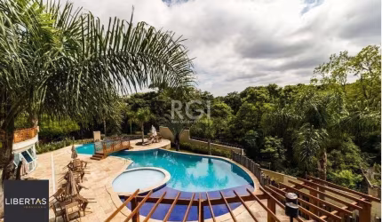 Casa em Condomínio 4 dormitórios à venda Teresópolis Porto Alegre/RS