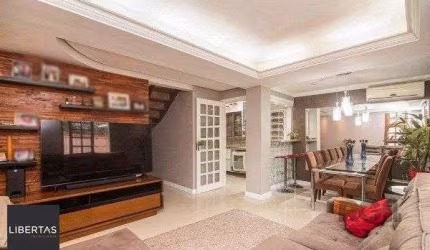 Casa no bairro Camaquã de 4 dormitórios e 2 vagas