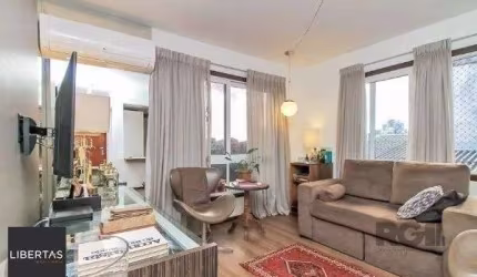 Apartamento no Bairro Auxiliadora de 1 dormitório e 2 vagas