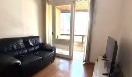 Apartamento no Centro de 1 dormitório, sacada e vaga