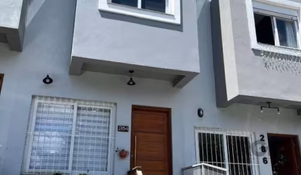 Sobrado 3 dormitórios à venda Guarujá Porto Alegre/RS