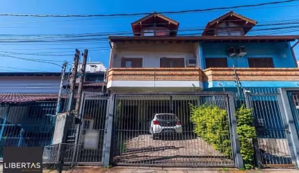 Casa 5 dormitórios no bairro Ipanema