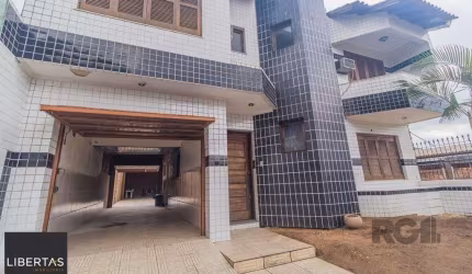 Casa com 240m², 3 dormitórios, 6 vagas no bairro Sarandi