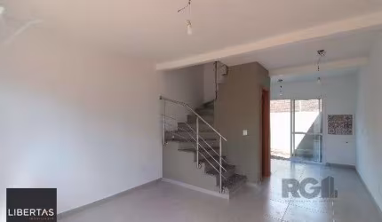 Casa Condominio em Porto Alegre, no bairro Vila Nova, com 2 dormitório(s), e 2 b