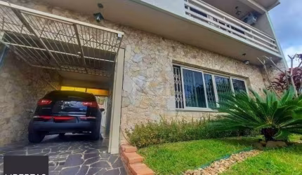 Excelente casa com 3 dormitórios e 3 vagas de garagem