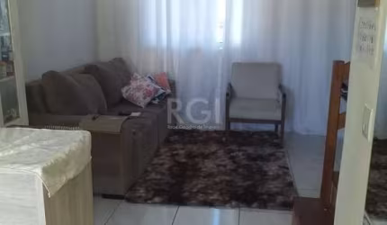 Casa com 2 quartos, banheiro, área de serviço, cozinha, vaga de garagem, no bair
