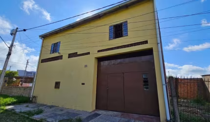 Casa no bairro Restinga - 3 dormitórios