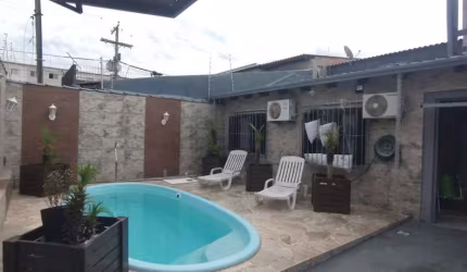 Casa no bairro Restinga com piscina com 4 dormitórios