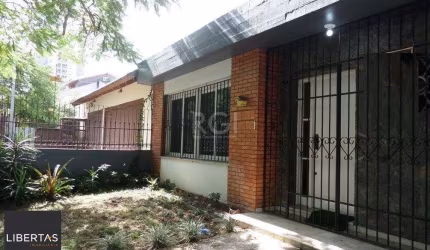 Casa no bairro Jardim Botânico de 3 dormitórios e 2 vagas