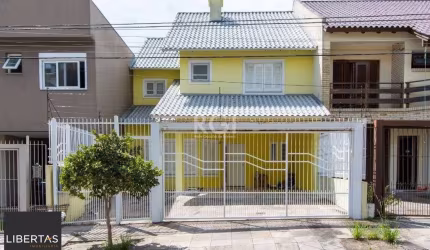 Uma suíte, estar íntimo, living 2 ambientes, lareira, lavabo, cozinha mobiliada,