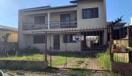 Sobrado 5 Dormitórios Localizado na Rua Bage no Bairro Niterói em Canoas RS