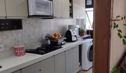 Apartamento semi-mobiliado com 2 dormitórios (sendo 1 suíte) e 1 vaga de garagem no Tabuleiro
