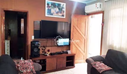 Casa com 3 dormitórios à venda, 110 m² por R$ 400.000,00 - Vila Voturuá - São Vicente/SP