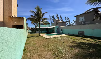LINDA CASA DE 3 QUARTOS NO CONDOMINIO LONG BEACH DE FRENTE PARA PRAIA