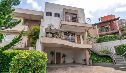 Casa em condomínio fechado com 3 quartos à venda na Avenida Edgar Pires de Castro, 540, Hípica, Porto Alegre por R$ 1.150.000