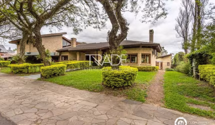 Casa em condomínio fechado com 5 quartos à venda na Avenida da Cavalhada, 5205, Cavalhada, Porto Alegre por R$ 3.300.000