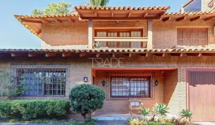Casa em condomínio fechado com 3 quartos à venda na Rua Carlos Júlio Becker, 295, Tristeza, Porto Alegre por R$ 820.000
