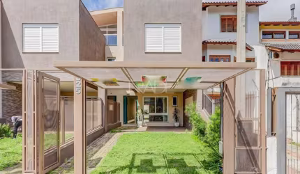 Casa com 3 quartos à venda na Rua Claudio da Silva Pinto, 325, Guarujá, Porto Alegre por R$ 790.000