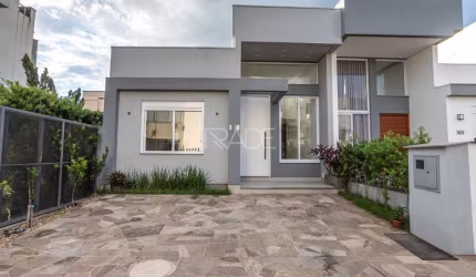Casa em condomínio fechado com 3 quartos à venda na Rua Eroni Soares Machado, 300, Hípica, Porto Alegre por R$ 630.000