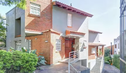 Casa em condomínio fechado com 3 quartos à venda na Rua Padre João Batista Reus, 1700, Tristeza, Porto Alegre por R$ 670.000