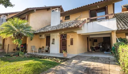 Casa em condomínio fechado com 4 quartos à venda na Rua Conselheiro Xavier da Costa, 2064, Jardim Isabel, Porto Alegre por R$ 990.000