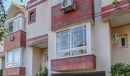 Casa em condomínio fechado com 3 quartos à venda na Avenida Copacabana, 255, Tristeza, Porto Alegre por R$ 1.300.000