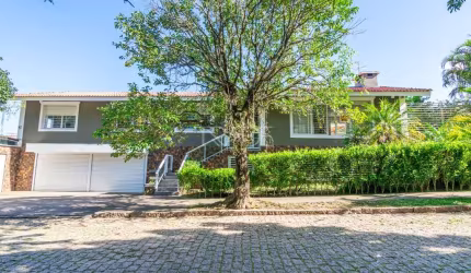 Casa com 3 quartos à venda na Rua Morano Calabro, 570, Jardim Isabel, Porto Alegre por R$ 1.500.000