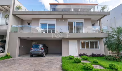 Casa em condomínio fechado com 4 quartos à venda na Rua Ivo Walter Kern, 599, Hípica, Porto Alegre por R$ 1.860.000