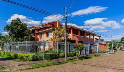 Casa com 4 quartos à venda na Rua Paulo Derly Strehl, 170, Ipanema, Porto Alegre por R$ 1.390.000
