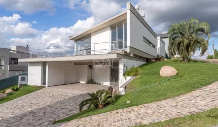 Casa em condomínio fechado com 4 quartos à venda na Estrada das Três Meninas, 2001, Vila Nova, Porto Alegre por R$ 3.500.000