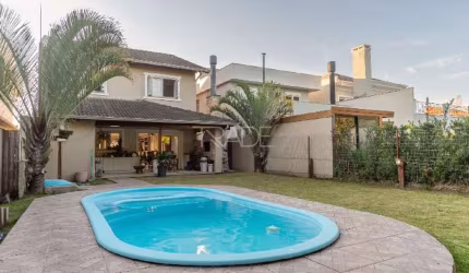Casa em condomínio fechado com 3 quartos à venda na Avenida Juca Batista, 8000, Belém Novo, Porto Alegre por R$ 1.280.000