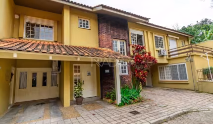 Casa em condomínio fechado com 3 quartos à venda na Rua Doutor Armando Barbedo, 832, Tristeza, Porto Alegre por R$ 780.000