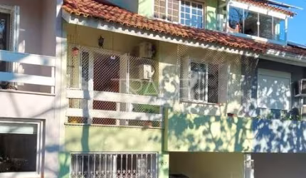 Casa em condomínio fechado com 3 quartos à venda na Rua Padre João Batista Reus, 983, Tristeza, Porto Alegre por R$ 929.000