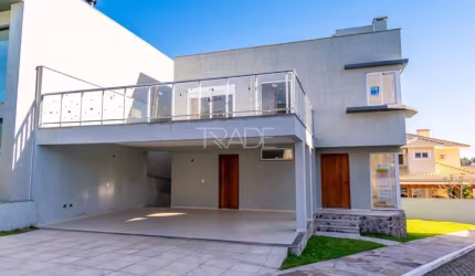 Casa em condomínio fechado com 3 quartos à venda na Rua Ivo Walter Kern, 599, Hípica, Porto Alegre por R$ 980.000