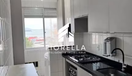 Apartamento à venda, com vista mar, 02 dormitórios, 01 vaga, no bairro Praia Comprida, São José/SC.
