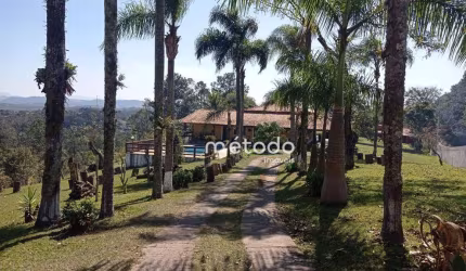 Chácara com 02 casas, 09 dormitórios ao total, à venda, 10.800 m² por R$ 2.000.000 - Parque Agrinco - Guararema/SP