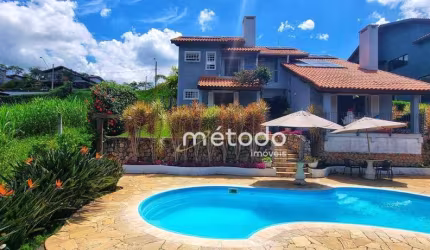 Casa com 4 dormitórios à venda, 242 m² por R$ 1.795.000,00 - Condomínio Residencial Alpes de Guararema - Guararema/SP