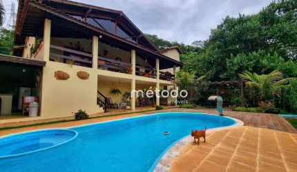 Casa com 4 dormitórios à venda, 260 m² por R$ 1.800.000,00 - Condomínio Residencial Alpes de Guararema - Guararema/SP